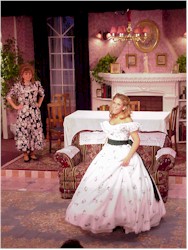 Lala shows off her dress.